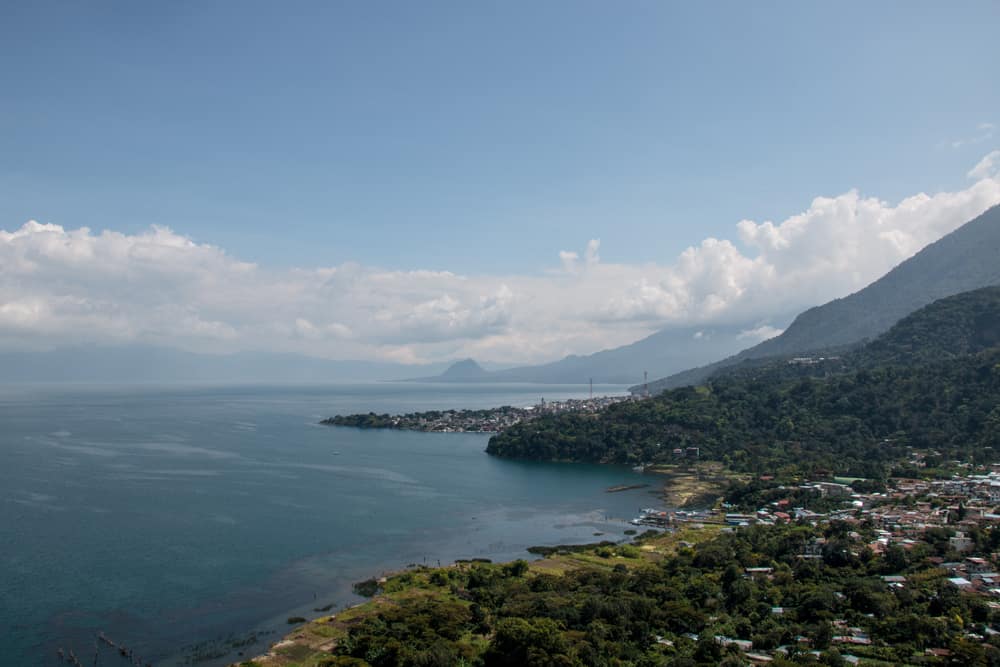 Lake Atitlan - large lake with a volcano beside it and a village on the shore