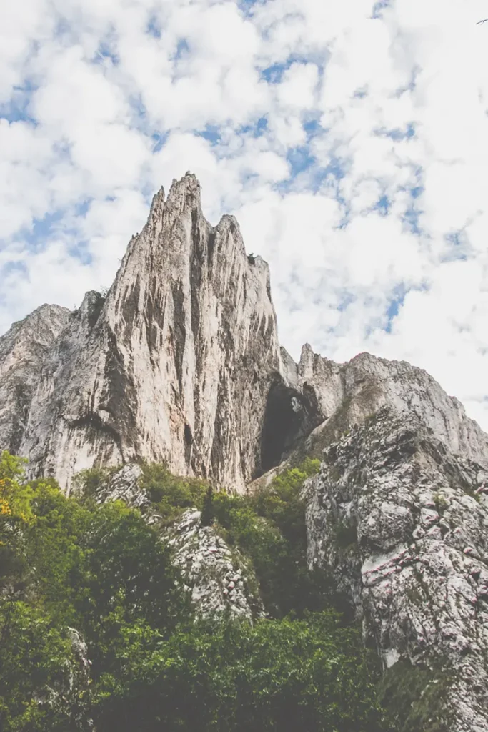 Sharp limestone mountain jutting up from Turda Gorge in Romania