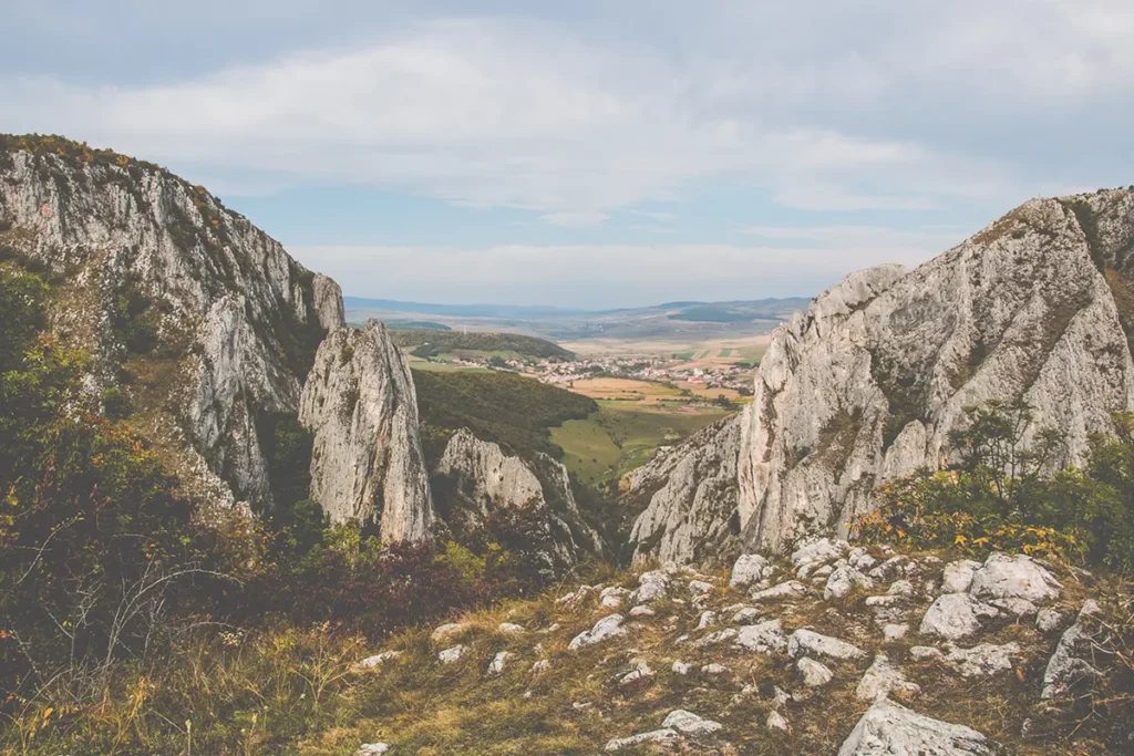 View over a Romanian landscape of prairies from high up a cliff at Turda Gorge.
